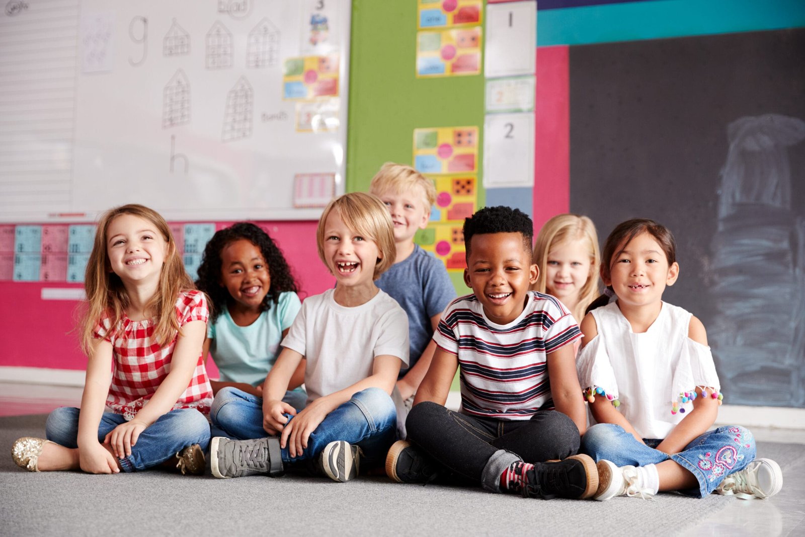 portrait-of-elementary-school-pupils-sitting